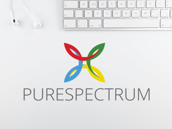 PureSpectrum logo on office desk