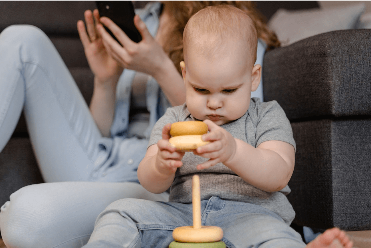 baby playing with toy