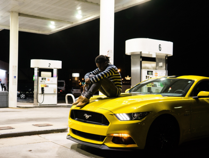 image of man at gas station