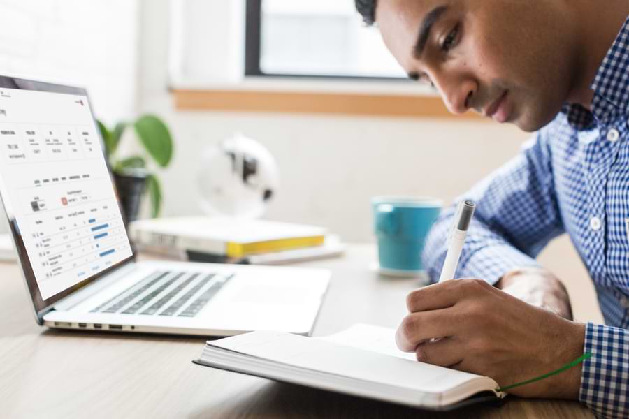 group of people on computer in office