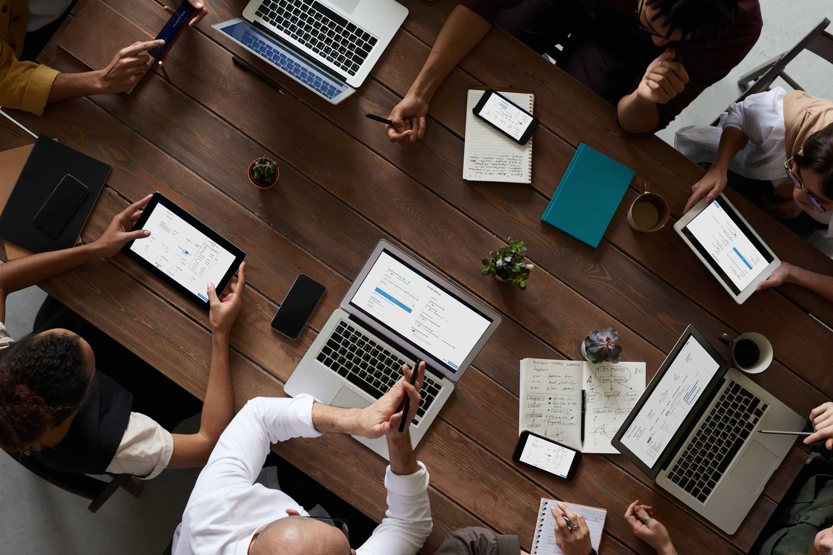 group of colleagues working with computers