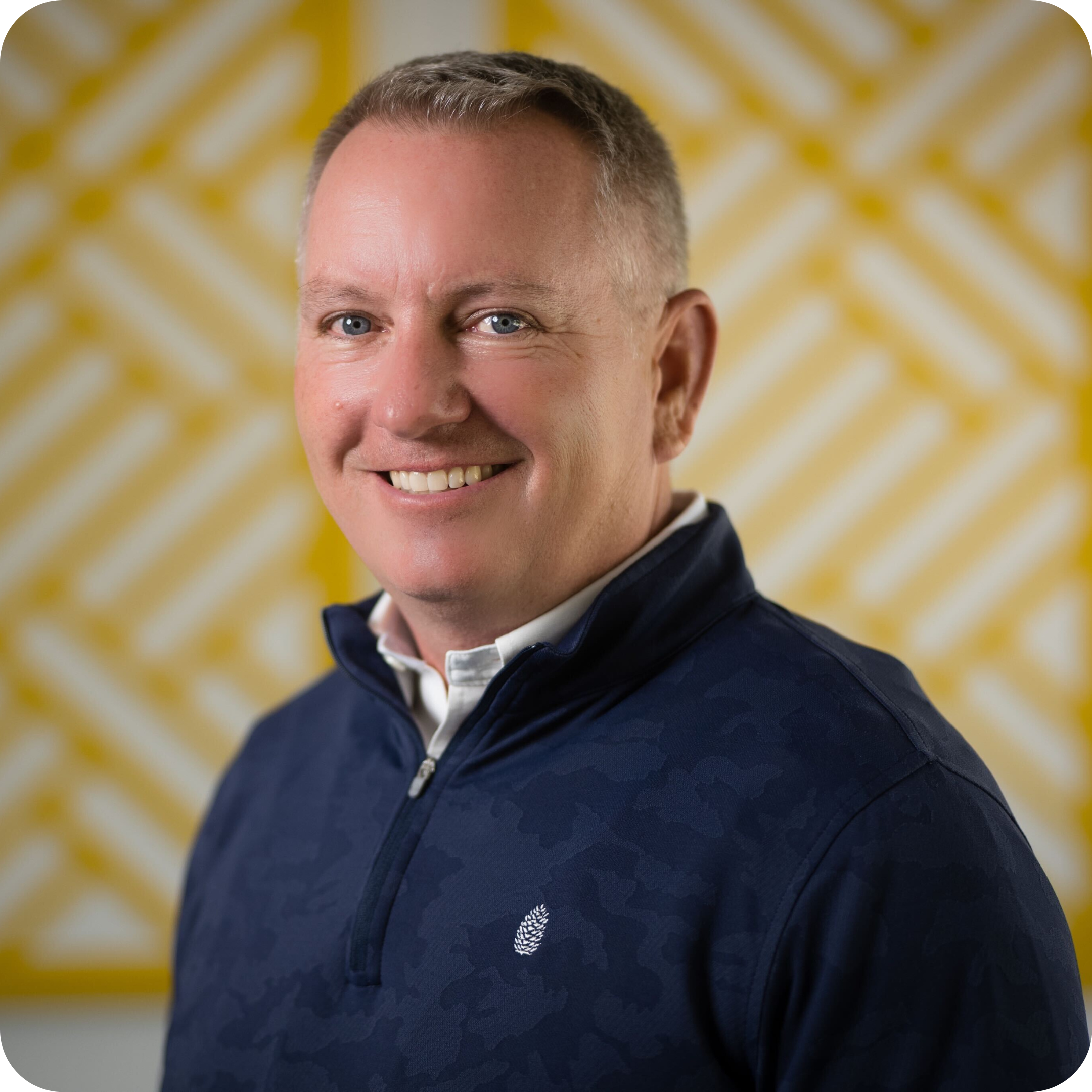 Michael McCrary in front of a yellow background.